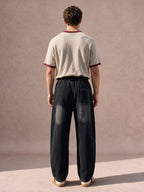 The Rivet Curve-Seam Pant (Washed Black)